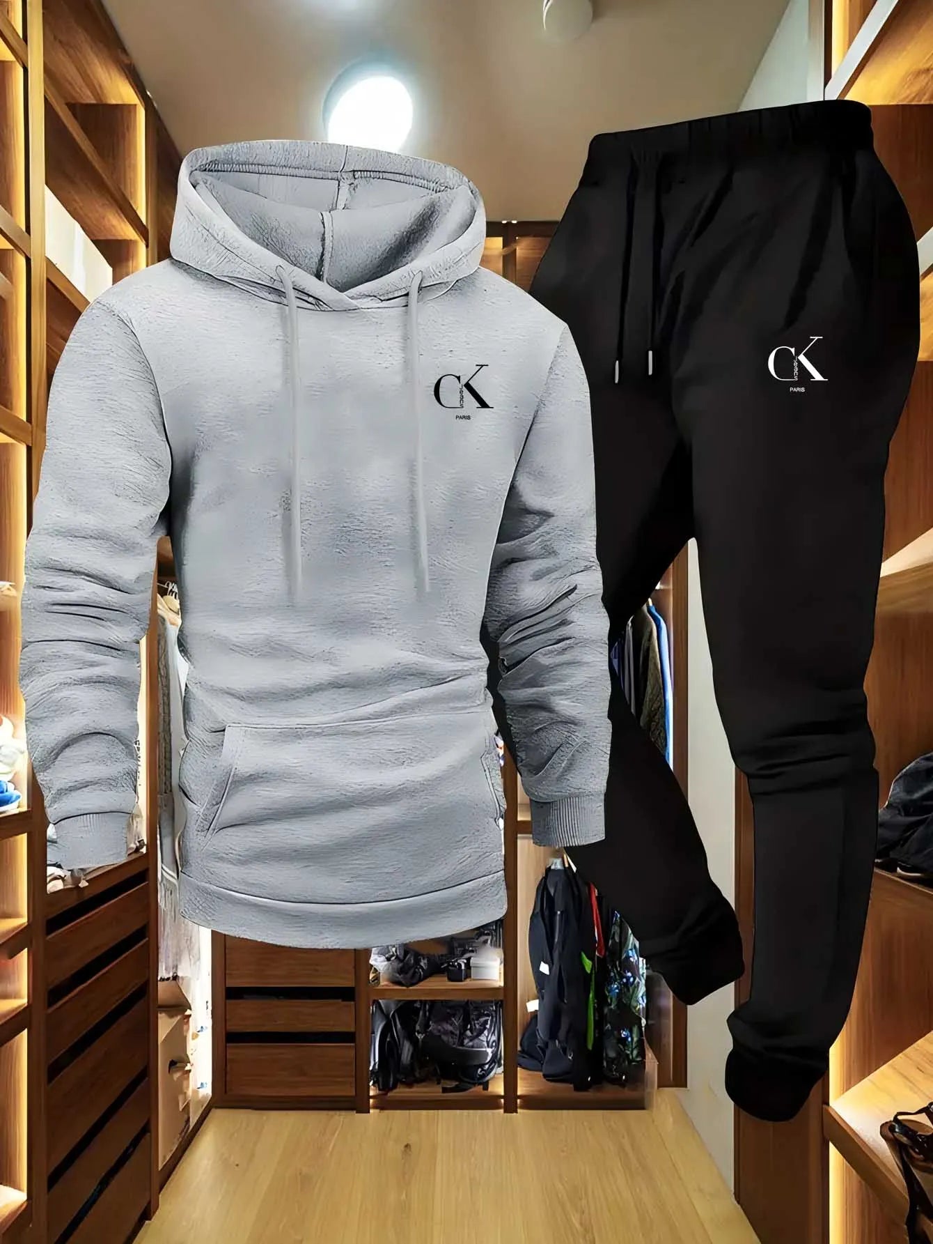 Conjunto de sudadera con capucha y pantalón deportivo para hombre: ropa de descanso casual en color gris con bolsillos, capucha con cordón ajustable y pretina acanalada, ideal para una comodidad de temporada."