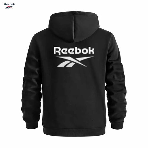 "Sudadera deportiva Reebok para hombre: sudadera con capucha tipo pullover, holgada y casual, de color liso con diseño de múltiples bolsillos, simple y limpia."