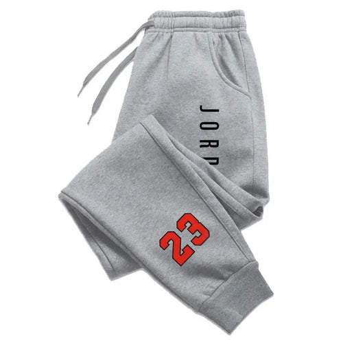 "Nuevos pantalones deportivos casuales para hombre y mujer (otoño/invierno), estilo urbano con letras estampadas y diseño atlético para adultos."
