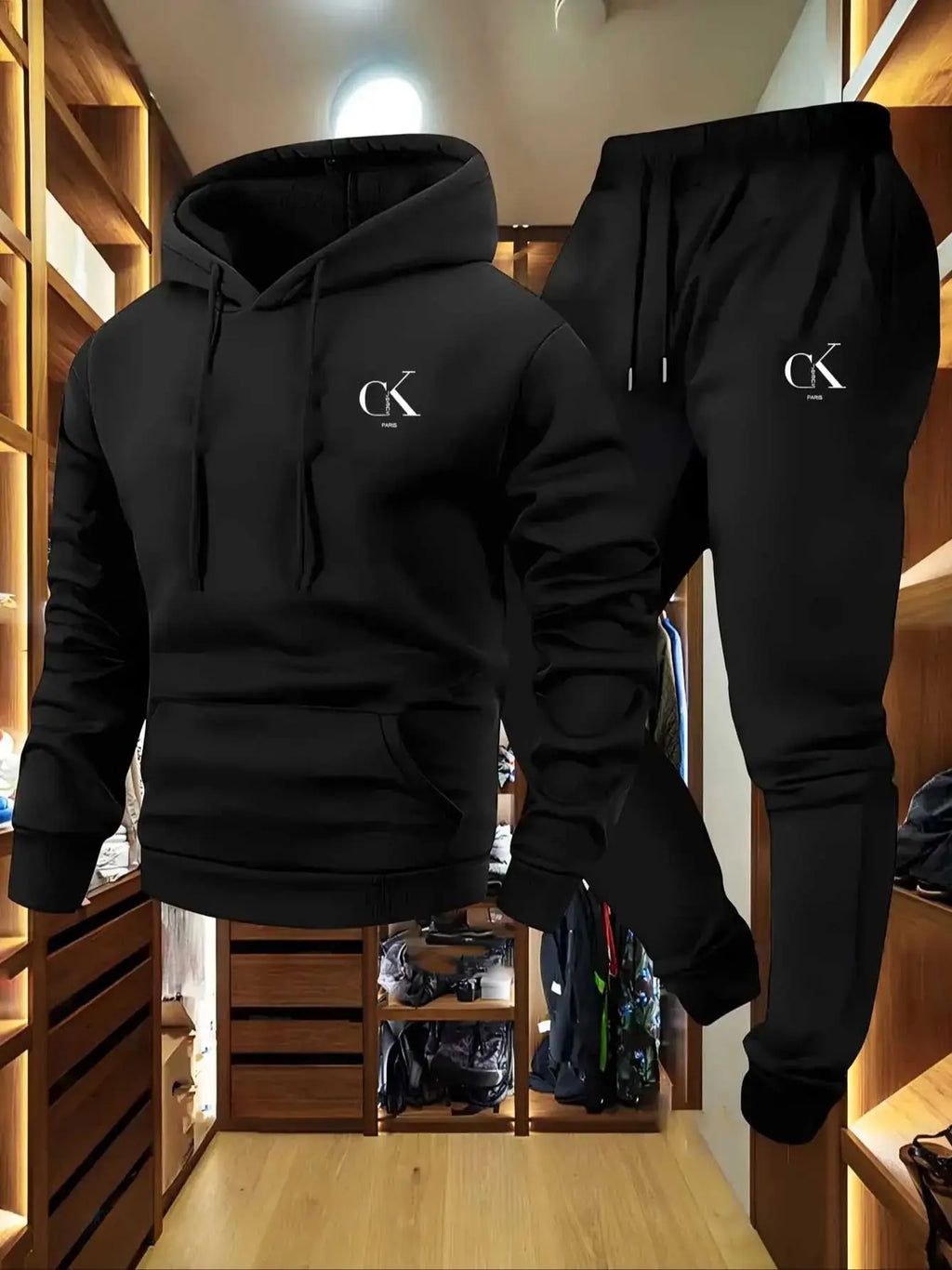 "Conjunto de sudadera con capucha y pantalón deportivo para hombre: ropa de descanso casual en color gris con bolsillos, capucha con cordón ajustable y pretina acanalada, ideal para una comodidad de temporada."